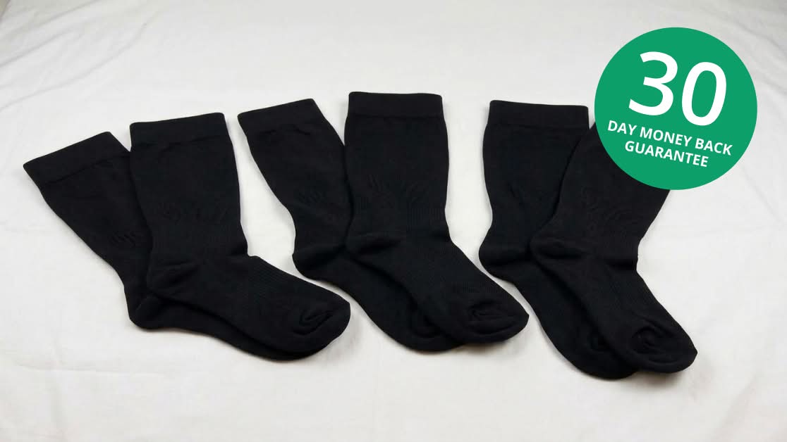 Several pairs of black socks with a 30-day money-back badge in the campaign photo.